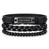 SEYOR men’s three-piece black bracelet set featuring a stainless steel cross plate, braided leather band and polished black beads on white.
