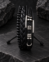 SEYOR men’s black bracelet set featuring polished beads, layered braided leather and silver-tone decorative details on dark stone.