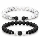 SEYOR men’s matching bracelet set featuring white howlite and matte black lava beads with dark metallic spacer rings on a white background.