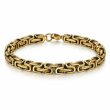 Men’s gold-tone stainless steel Byzantine link bracelet with dark inner accents and a lobster clasp on a white background.