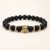 SEYOR men's black lava stone bracelet with a polished gold leopard centerpiece and crystal detailed spacers