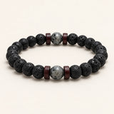 SEYOR men's black lava stone bracelet featuring grey marbled beads and dark wooden spacer accents