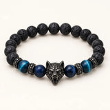 SEYOR men's black lava bead bracelet featuring blue tiger eye stones, metallic spacers and a detailed wolf centerpiece