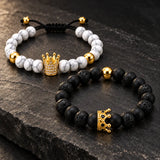 Close-up of SEYOR men's black lava stone and white marble bead bracelet set with gold crown accents