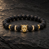 Close-up of SEYOR men's black lava bead bracelet featuring a gold leopard head and crystal spacer accents