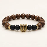 SEYOR men's brown wooden bead bracelet with matte black beads, gold owl charm and crystal spacers