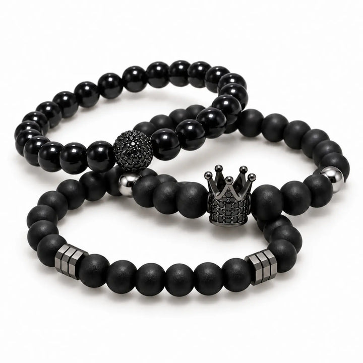 SEYOR three-piece men’s bracelet set featuring polished black beads, matte black beads, a crown centerpiece and gunmetal accents.