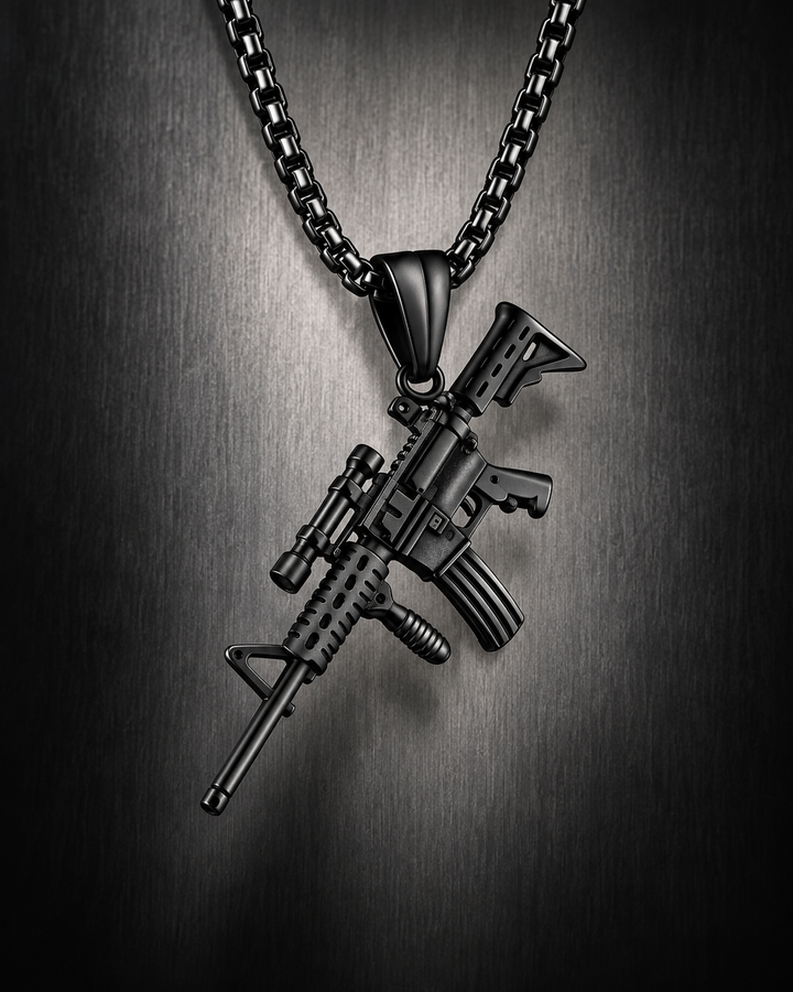 Black M4 rifle pendant necklace with matching box chain, smoky background, and mirrored reflection