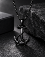Man wearing the SEYOR black anchor pendant necklace with a matching black box-link chain