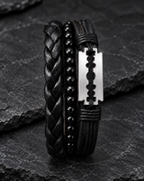 Black braided, beaded and multilayer men’s bracelets with silver-tone blade emblem on dark stone